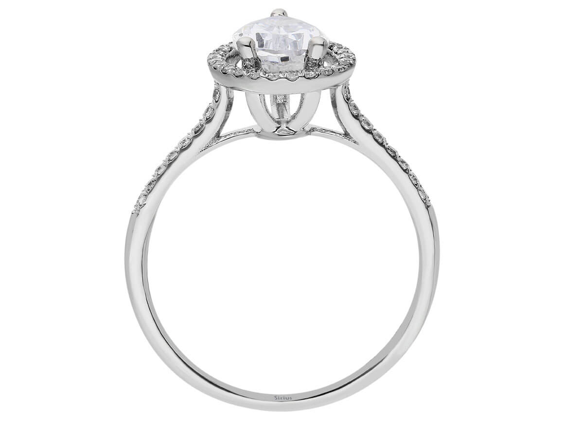 Radiant diamond and white topaz ring with pear cut