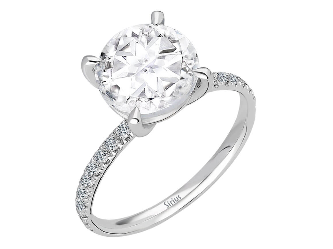 Solitaire ring with lab-grown diamonds and white topaz in white gold