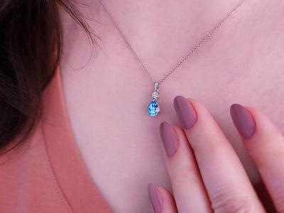 Pendant with Drop Mystique: Blue Topaz & Lab Diamond in 14K White Gold