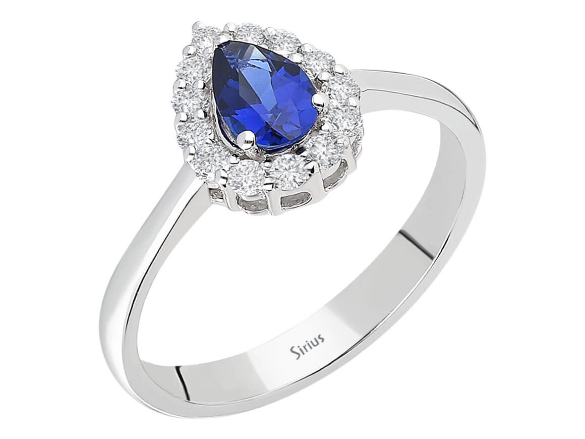 Eleganter Weißgoldring mit 13 laborgezüchteten Diamanten und einem tropfenförmigen Saphir