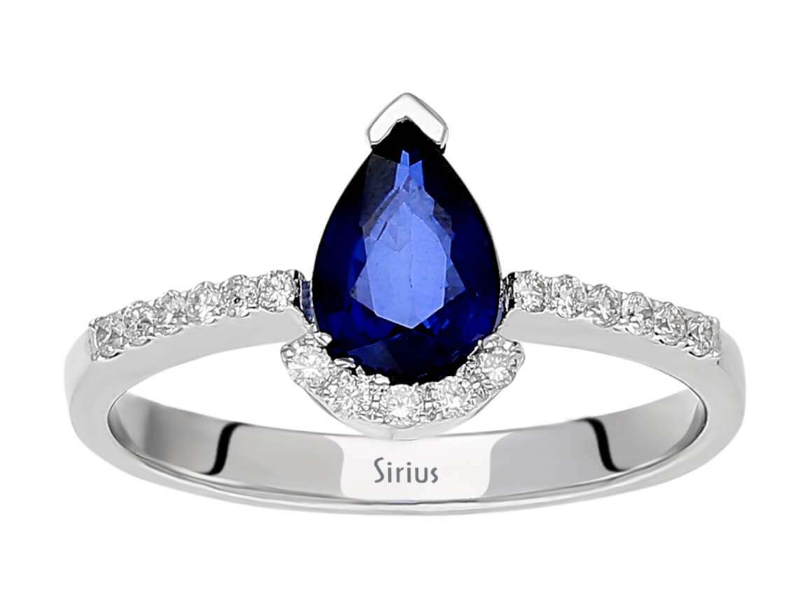 Elegant laboratory diamond and teardrop sapphire ring made of 14 karat white gold