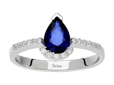 Elegant laboratory diamond and teardrop sapphire ring made of 14 karat white gold