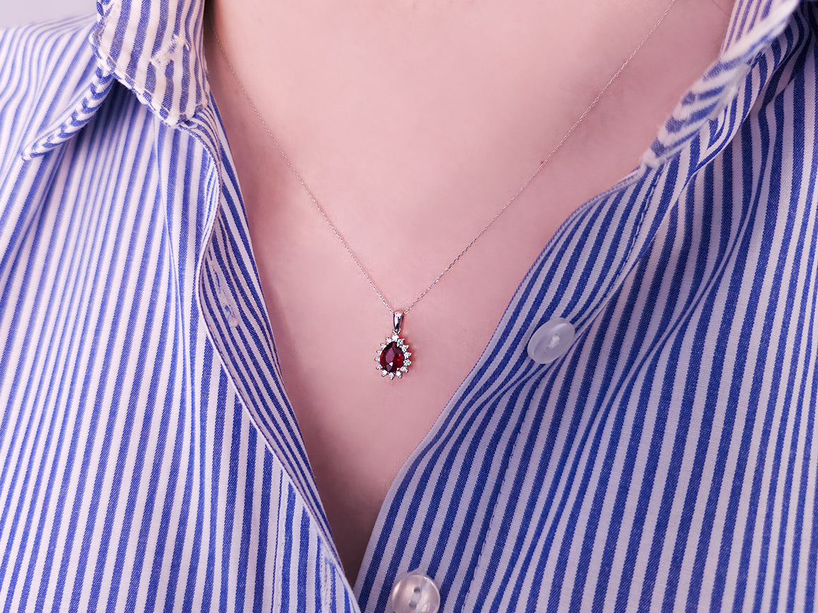 Anturaj pendant with ruby in teardrop shape and diamonds – 14K white gold