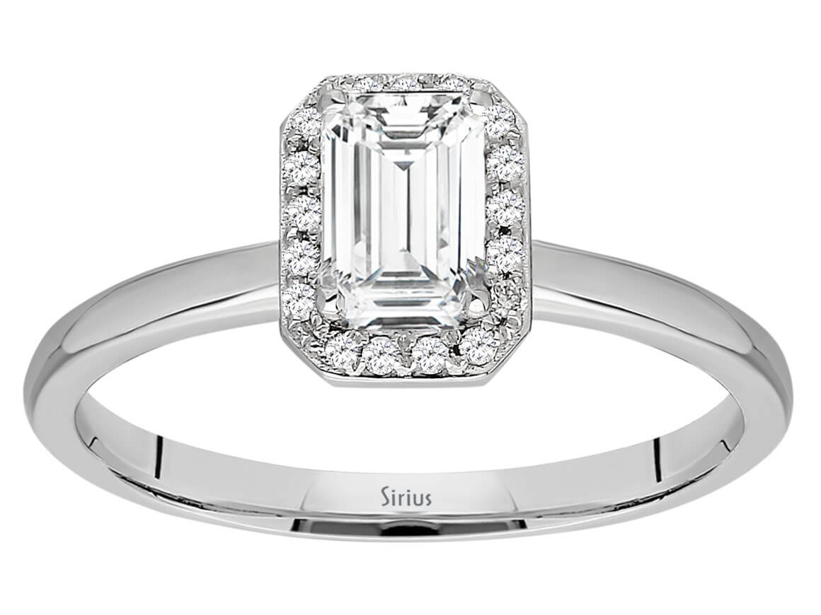 Weißgoldring mit weißem Saphir und Smaragd