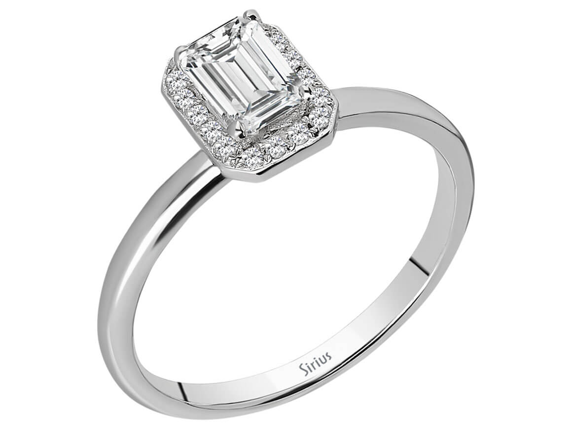 Weißgoldring mit weißem Saphir und Smaragd