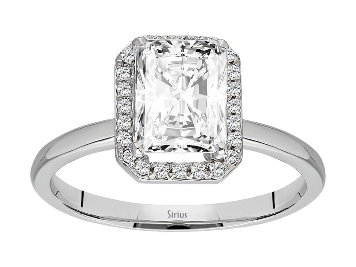 Weißgoldring mit weißem Saphir und Smaragd