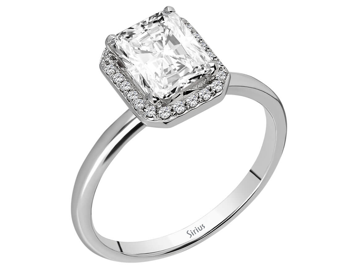 Weißgoldring mit weißem Saphir und Smaragd