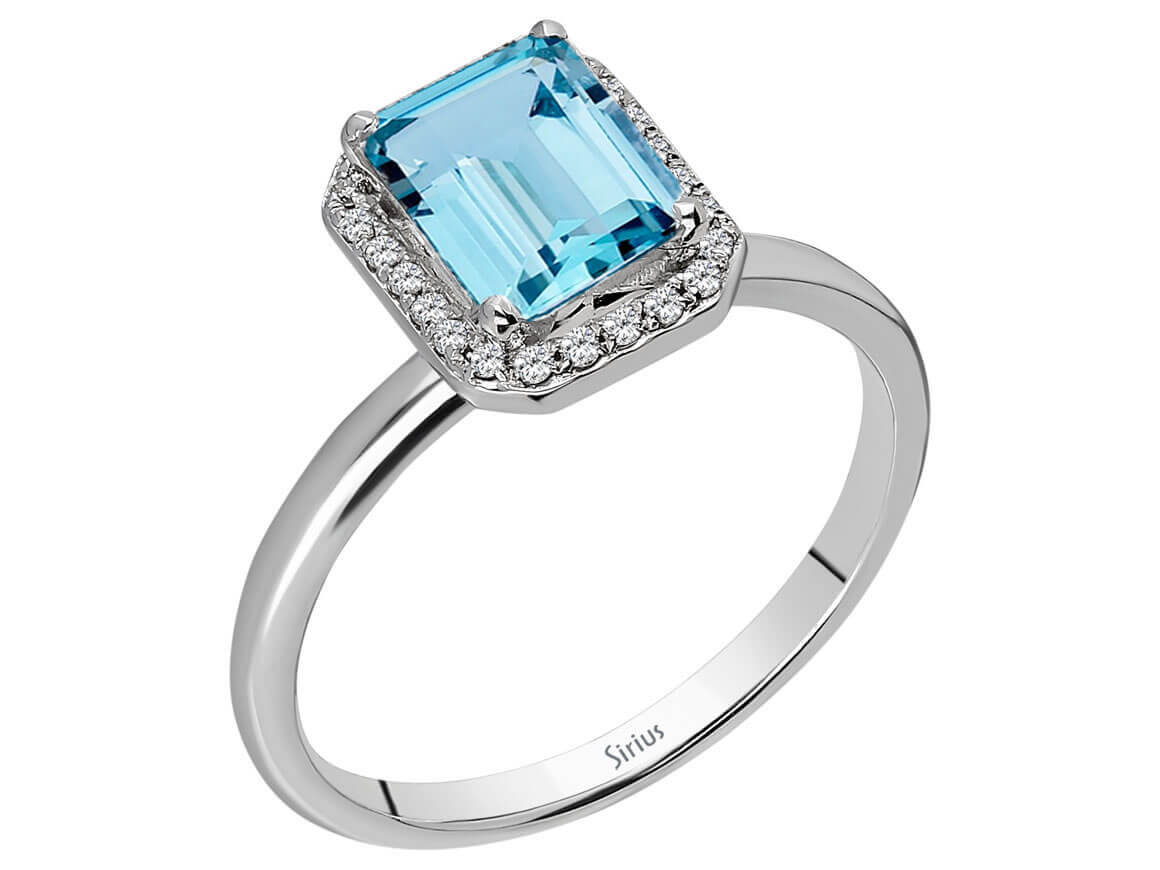 White gold ring with 24 diamonds and 1 emerald-cut blue Topaz – high-quality Jewelry from Rosy Lab Diamonds