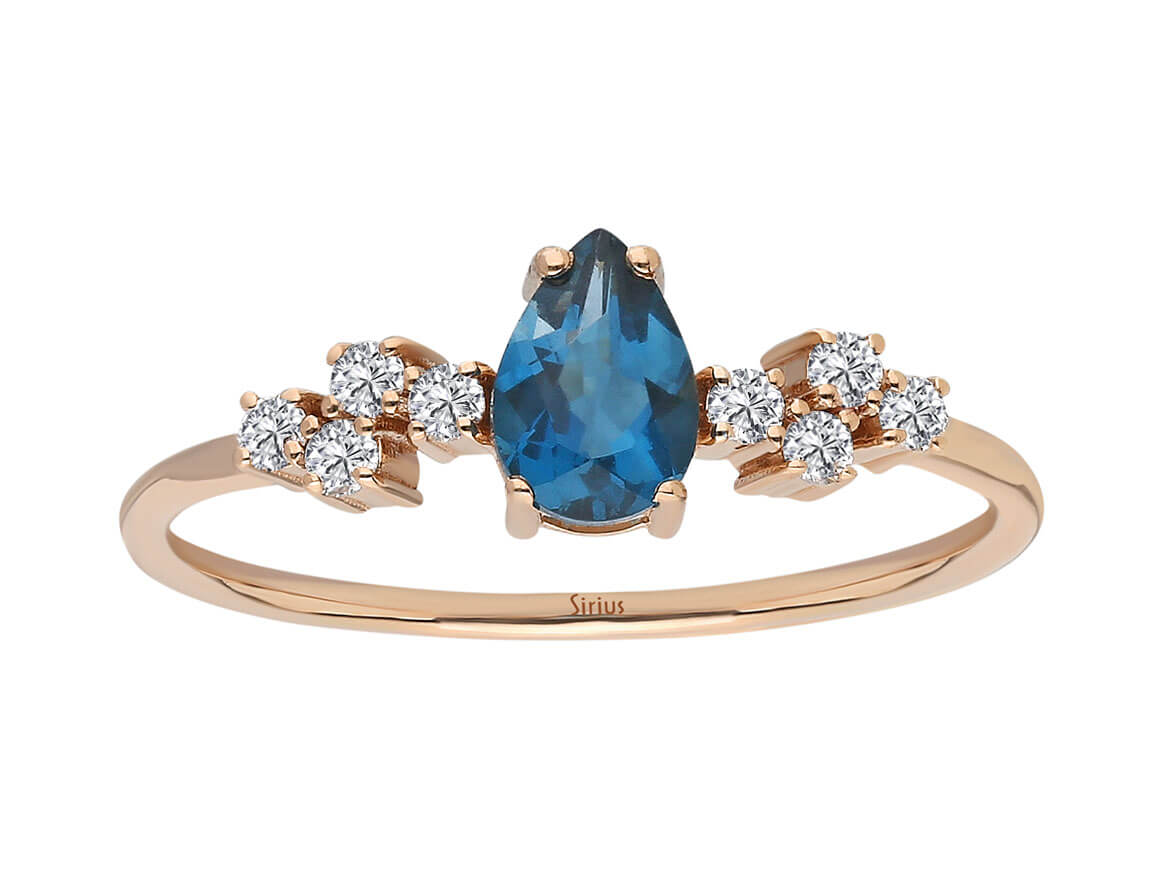 Rose gold ring with London blue topaz and diamonds – 0.52 carat teardrop shape
