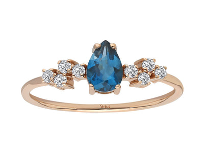 Rose gold ring with London blue topaz and diamonds – 0.52 carat teardrop shape