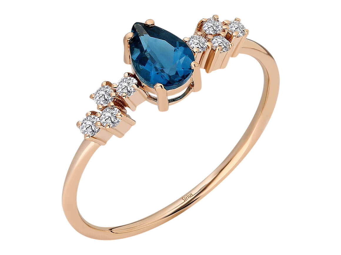 Rose gold ring with London blue topaz and diamonds – 0.52 carat teardrop shape