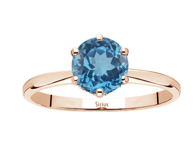 Elegant ring with lab-grown diamonds and London Blue topaz