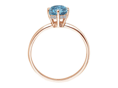 Elegant ring with lab-grown diamonds and London Blue topaz