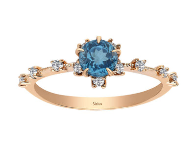 Rose gold ring with 0.71 carat London blue topaz and diamonds, 14K