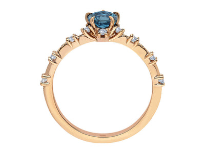 Rose gold ring with 0.71 carat London blue topaz and diamonds, 14K