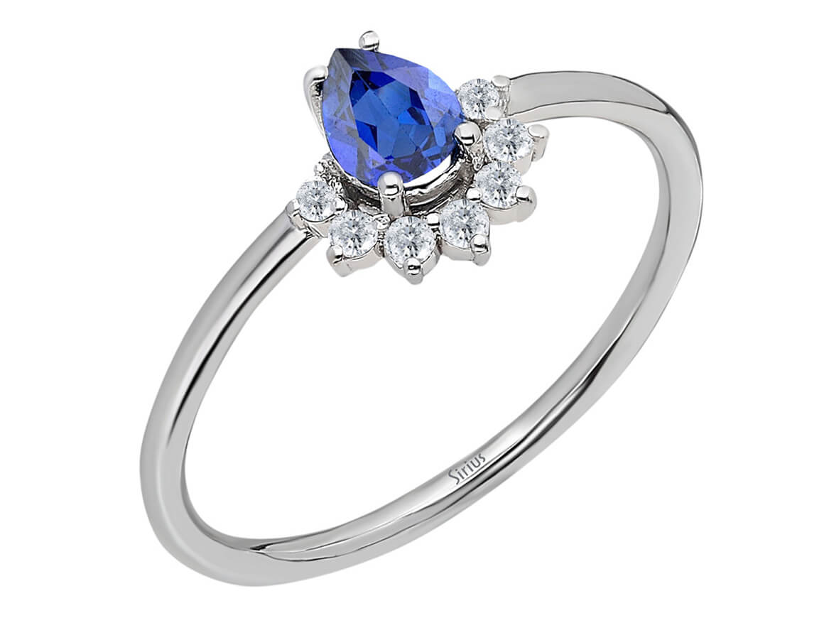 Weißgold Ring mit blauem Saphir und Diamanten