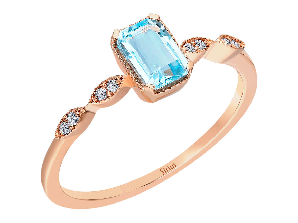 Aqua Ring mit Blauem Topas im Oktagon-Schliff und Diamanten aus 8K Roségold – 0,74 ct