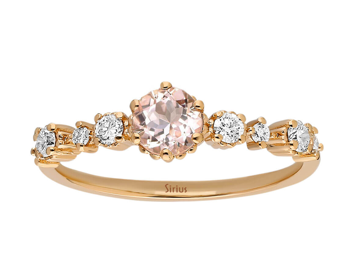 14 Karat rose gold ring with morganite and round cut diamond