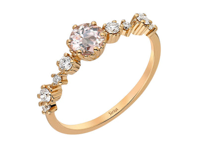 14 Karat rose gold ring with morganite and round cut diamond