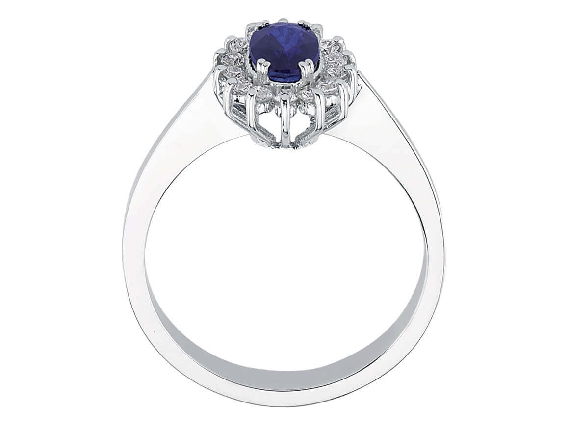Elegant white gold ring with oval sapphire and pavé diamonds