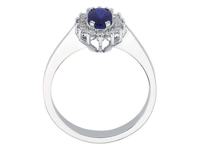 Elegant white gold ring with oval sapphire and pavé diamonds