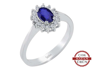 Elegant white gold ring with oval sapphire and pavé diamonds
