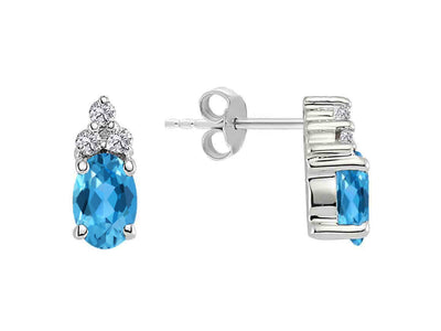 Clous d'oreilles avec topaze bleue et diamants de laboratoire en or blanc 333