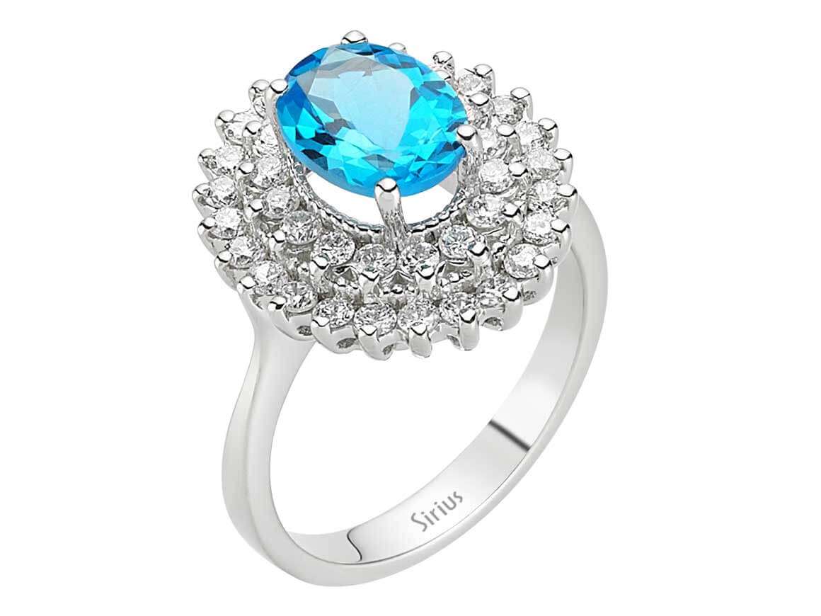 Eleganter Ring mit 40 runden Diamanten und 1 ovalem blauen Topas in 14 Karat Weißgold