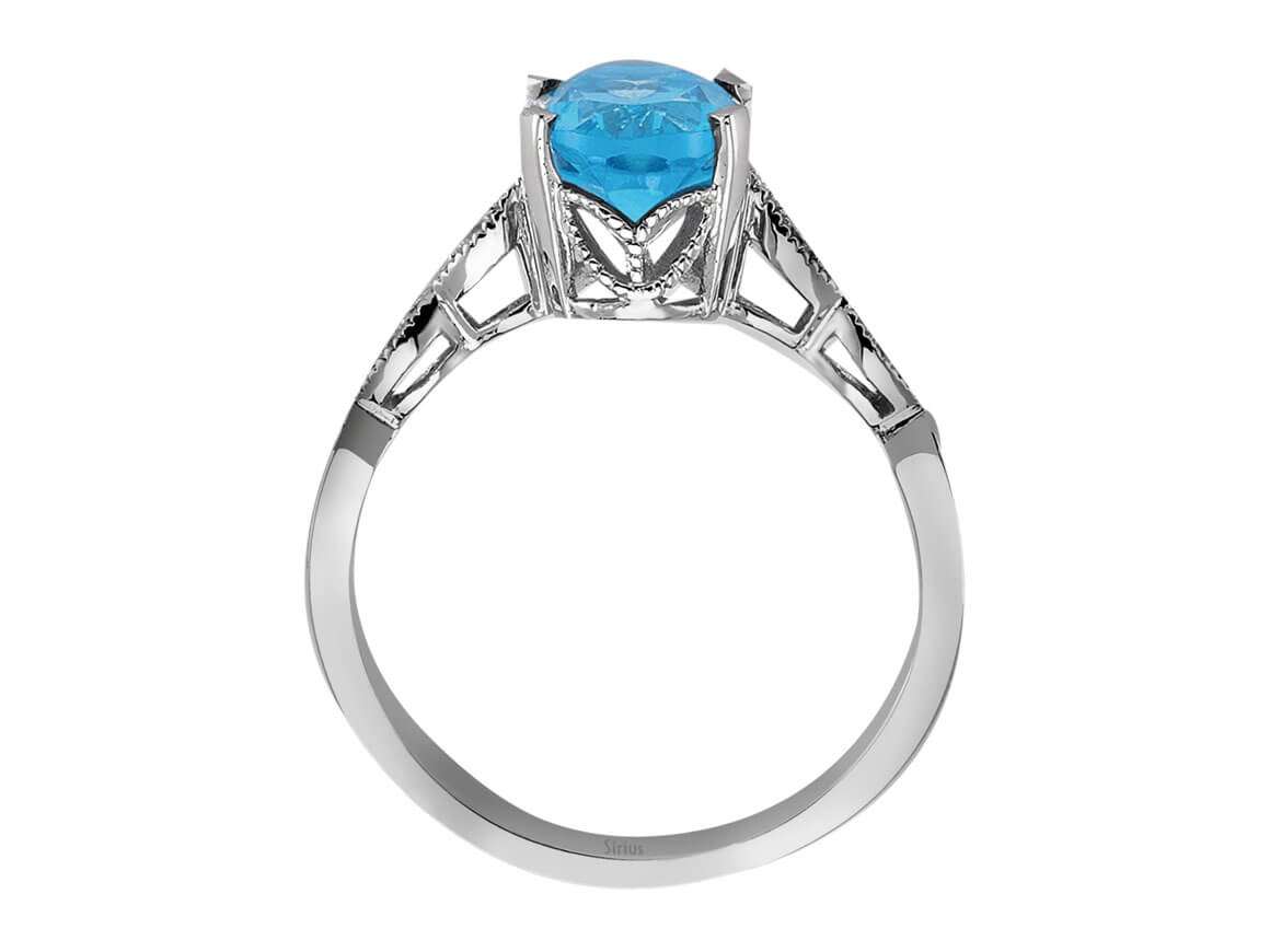 Weißgold Ring mit 4 rund geschliffenen Diamanten und 1 ovalen blauen Topas – 14K