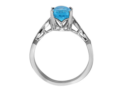 Weißgold Ring mit 4 rund geschliffenen Diamanten und 1 ovalen blauen Topas – 14K