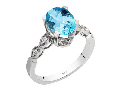 Weißgold Ring mit 4 rund geschliffenen Diamanten und 1 ovalen blauen Topas – 14K