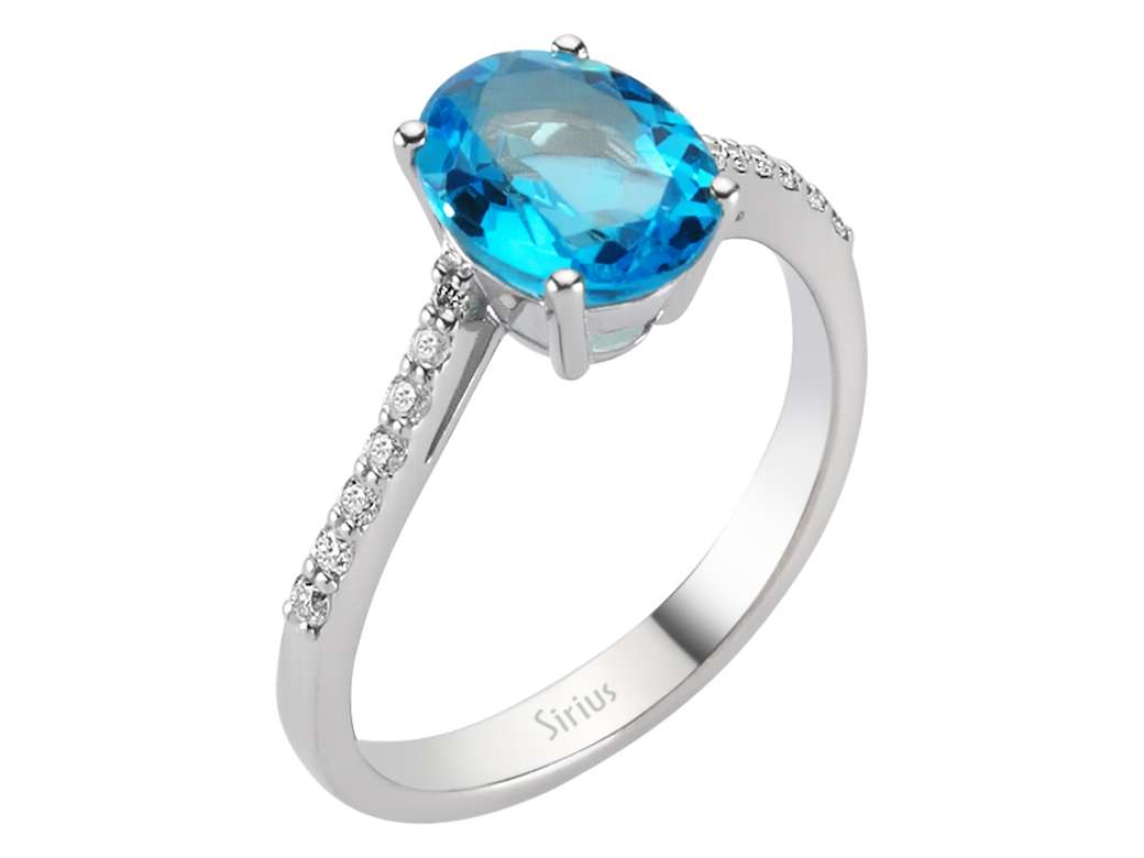 Weißgoldring mit ovalem 2,02 ct Blautopas und 14 Brillanten