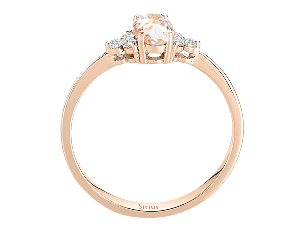 Elegant 14 Karat Rose Gold Ring with 6 Round Diamonds and 1 Oval Morganite