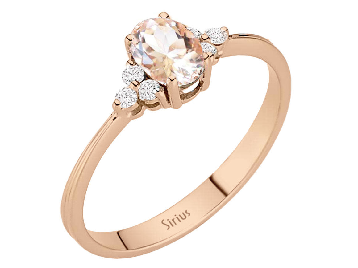 Elegant 14 Karat Rose Gold Ring with 6 Round Diamonds and 1 Oval Morganite