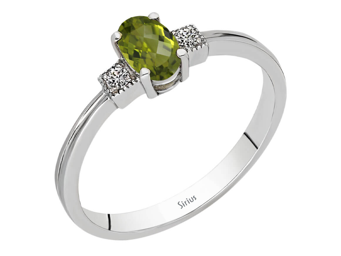 Eleganter Ring mit 2 rund geschliffenen Diamanten und 1 ovalem Peridot, 8 Karat Weißgold