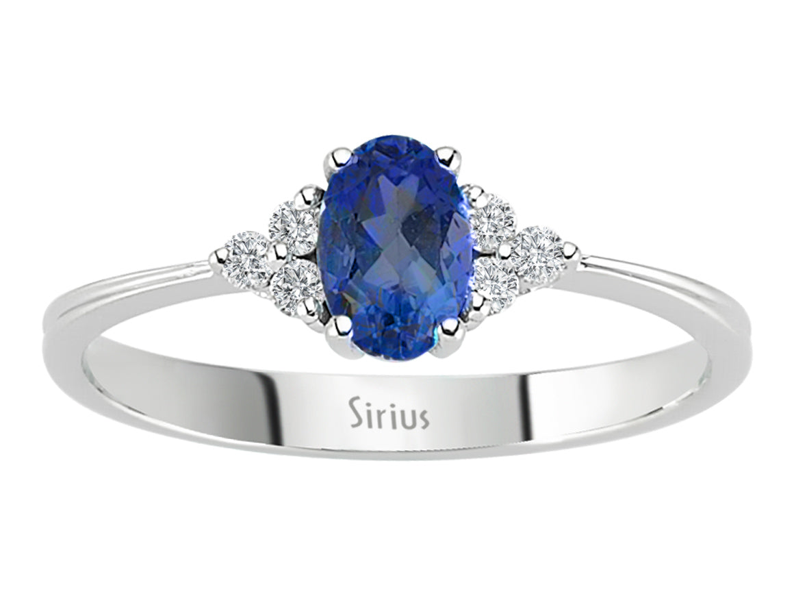 Elegant 8 Carat White Gold Ring with 6 Round Diamonds and an Oval Sapphire