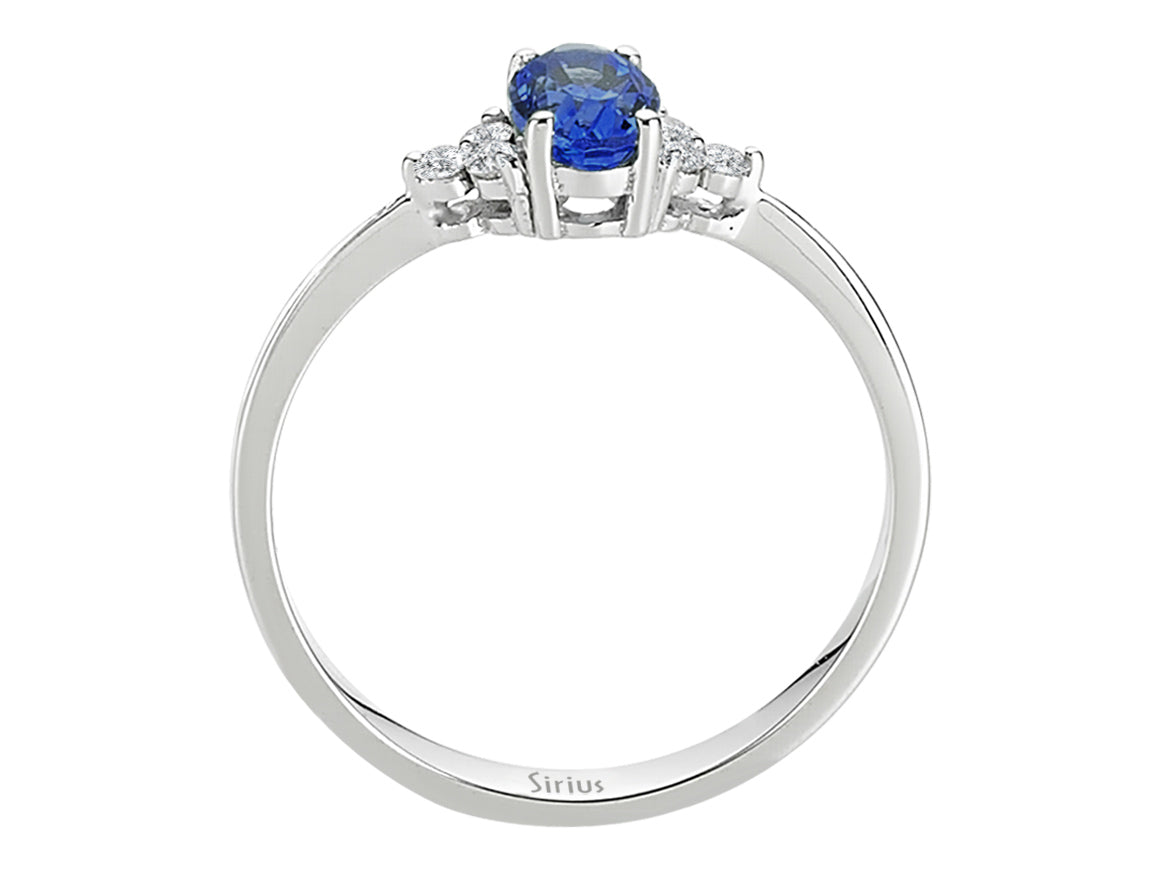 Elegant 8 Carat White Gold Ring with 6 Round Diamonds and an Oval Sapphire