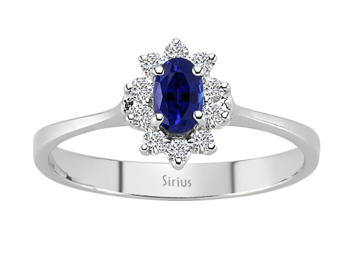 Eleganter Ring mit 10 rund geschliffenen Diamanten und 1 ovalem Saphir, 14 Karat Weißgold