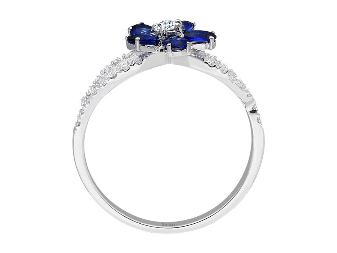 Eleganter Ring mit 1 rund geschliffenem Diamanten, 26 rund geschliffenen Diamanten und 5 ovalen Saphiren