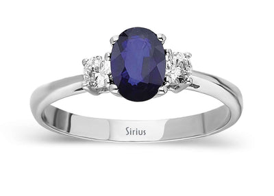 Weißgoldring mit 2 laborgezüchteten Diamanten und einem ovalen Saphir