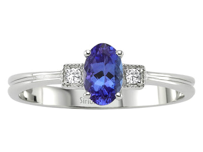 Elegant ring with oval tanzanite and two small diamonds in rose gold