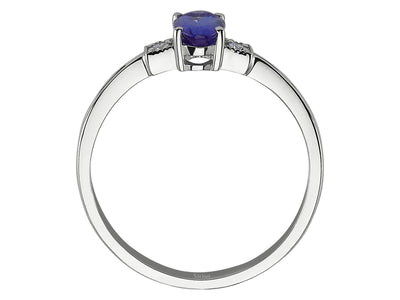 Elegant ring with oval tanzanite and two small diamonds in rose gold