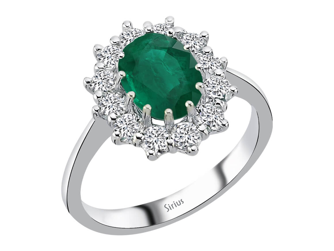 Anturaj ring with oval cut emerald and 12 lab diamonds