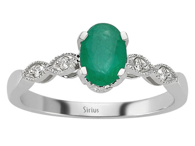 Weißgoldring mit 4 rund geschliffenen Diamanten und 1 ovalem Smaragd – 0,05 ct + 0,75 ct