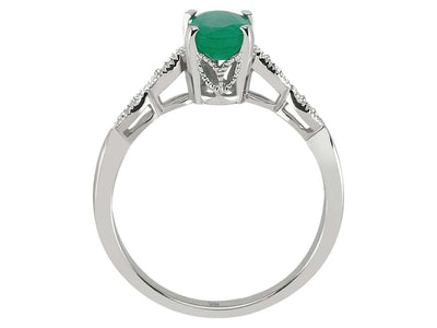 Weißgoldring mit 4 rund geschliffenen Diamanten und 1 ovalem Smaragd – 0,05 ct + 0,75 ct