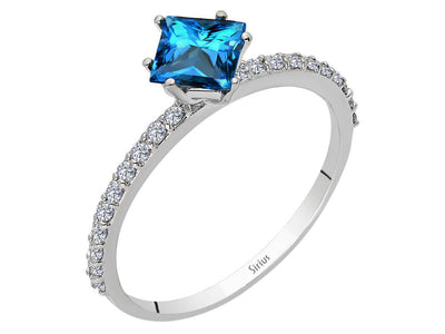 Sparkling diamond and London blue topaz ring with princess cut