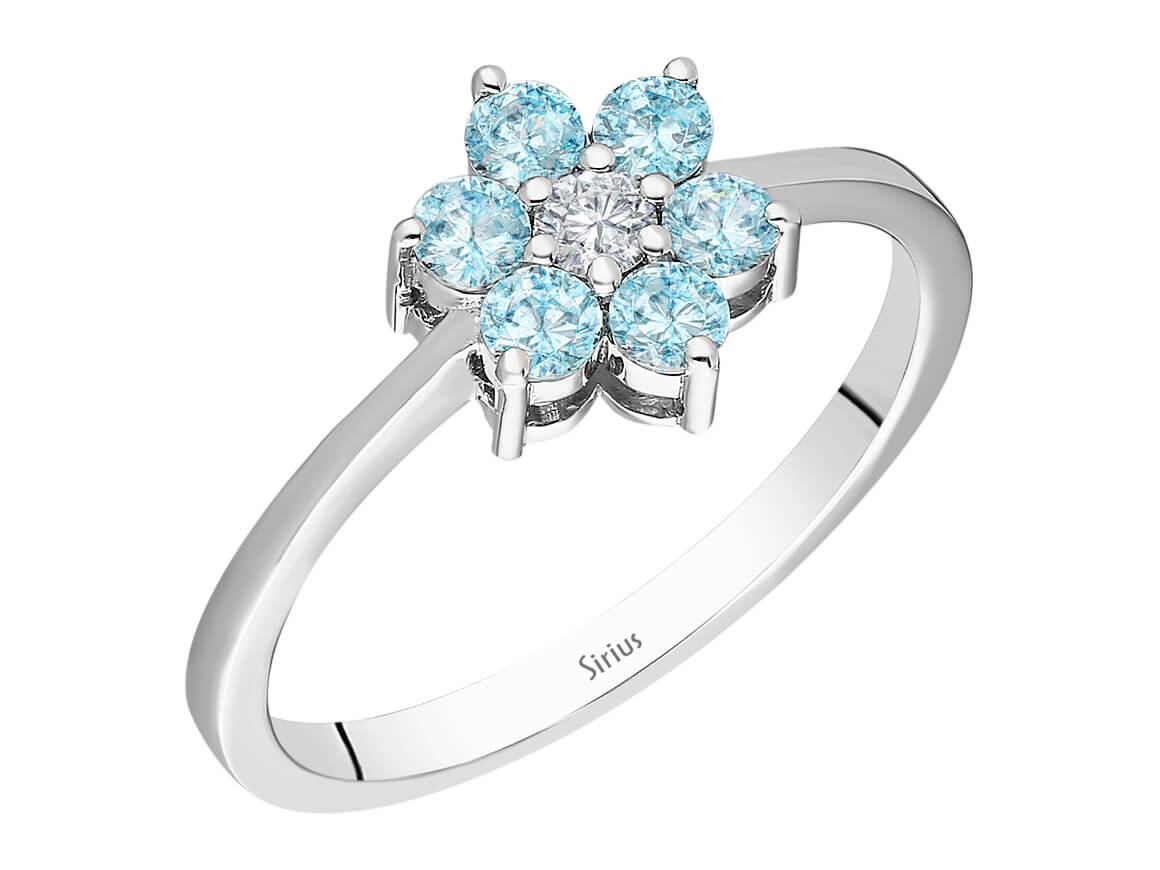 Flower ring with sky blue topazes & diamond – 0.39 ct in 8K white gold