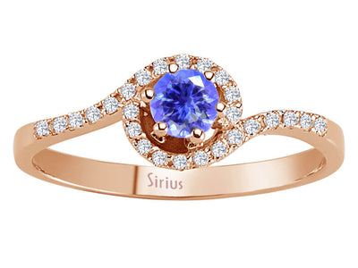Rose gold ring with 26 diamonds and 1 tanzanite
