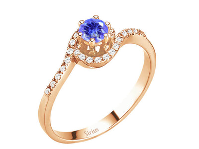 Rose gold ring with 26 diamonds and 1 tanzanite