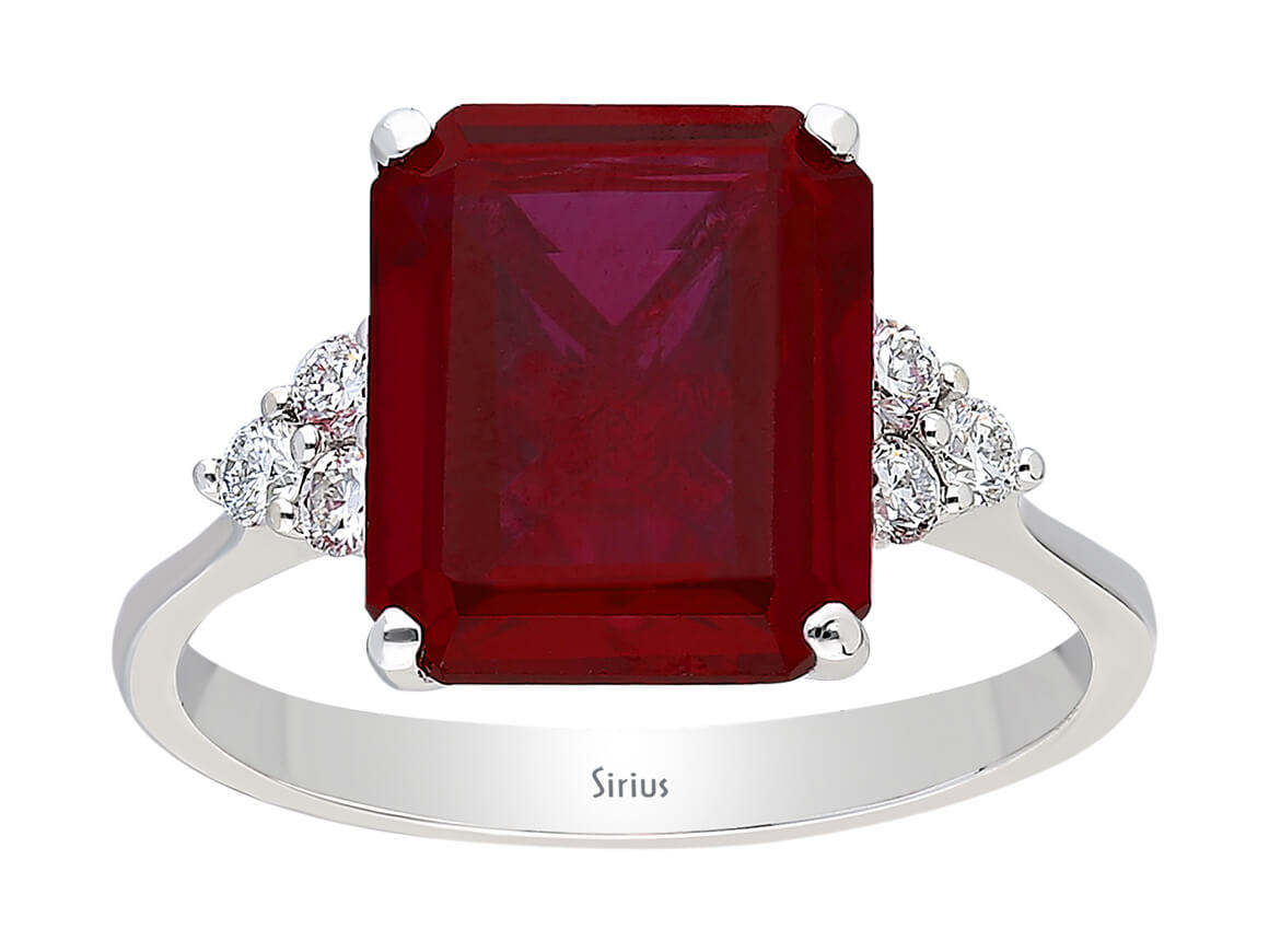 14 Karat Weißgold Ring mit 6 runden Diamanten und 1 oktagonem Rubin – 2,65 Gramm